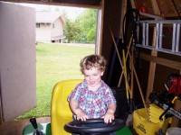 Mark playing on tractor