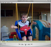 Video of Mark on swing in backyard.