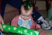 Andrew with a bow on his head at Christmas