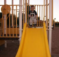Andrew on slide at park