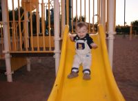 Andrew on slide at park