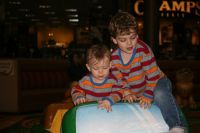 Andrew and Mark in play area at the mall