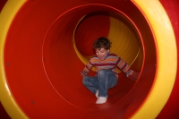 Mark sliding down the slide